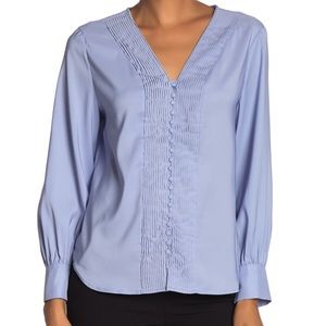 New with tags. Tahari blouse shirt. Size medium.